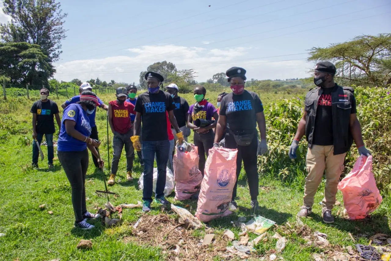 Volunteers with collection bags during a clean-up at Lake Nakuru National Park
